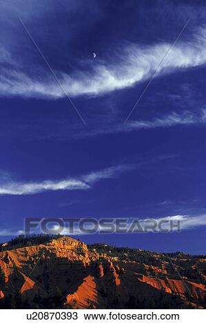 Bands of cloud above rocky desert terrain View Large Photo Image Stock Image - Bands of cloud above rocky desert terrain. Fotosearch