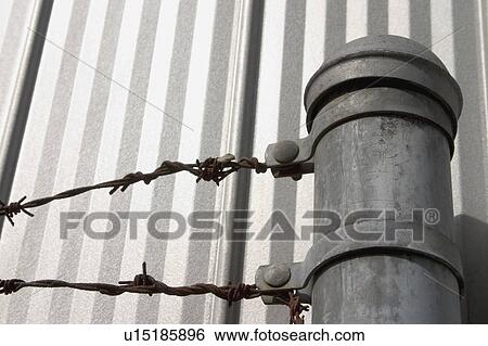 Stock Photograph - Barbed wire fence. Fotosearch