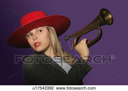 Stock Image - Blowing your own trumpet. Fotosearch