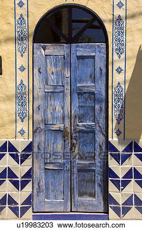 Blue painted door and tiles View Large Photo Image Stock Image - Blue painted door and tiles. Fotosearch