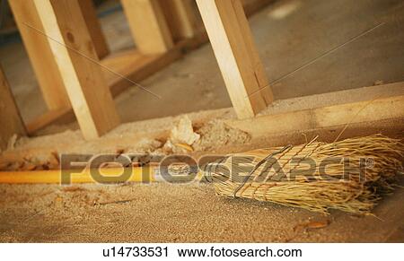 Stock Image - Broom in construction area. Fotosearch