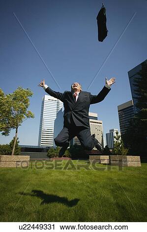 Stock Image - Businessman celebrates. Fotosearch