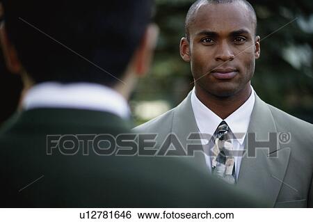 Businessman conversation View Large Photo Image Stock Photograph - Businessman conversation. Fotosearch