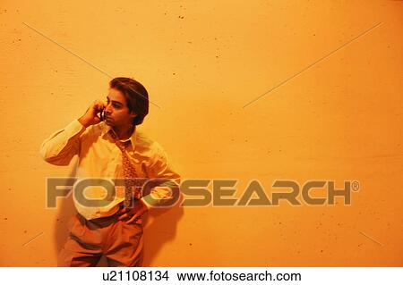 Picture - Businessman on cell phone. Fotosearch