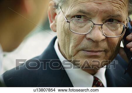 Businessman on the phone View Large Photo Image Picture - Businessman on the phone. Fotosearch