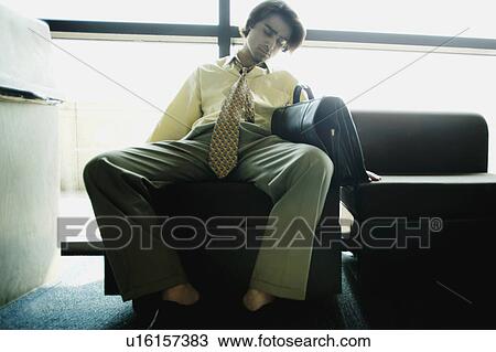 Businessman takes a nap View Large Photo Image Stock Image - Businessman takes a nap. Fotosearch
