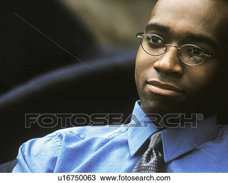 Stock Image - Businessman thinking. Fotosearch