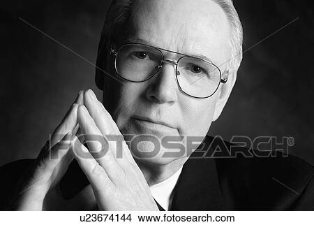 Picture - Businessman wearing glasses. Fotosearch