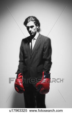 Businessman with boxing gloves View Large Photo Image Stock Photography - Businessman with boxing gloves. Fotosearch