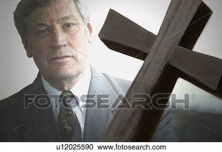 Businessman with cross View Large Photo Image Stock Image - Businessman with cross. Fotosearch