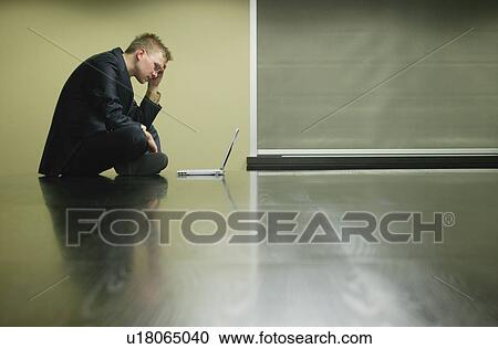 Businessman with laptop View Large Photo Image Stock Image - Businessman with laptop. Fotosearch