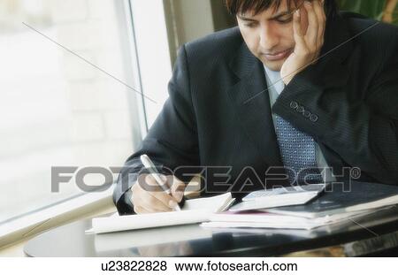 Businessman working View Large Photo Image Stock Photo - Businessman working. Fotosearch