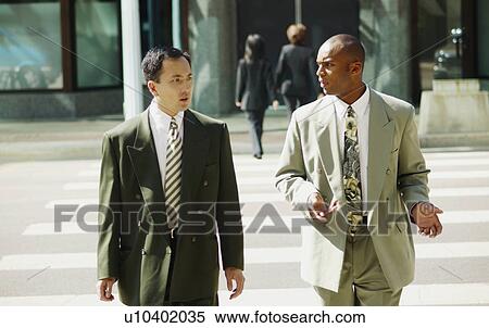 Businessmen have a discussion View Large Photo Image Stock Photography - Businessmen have a discussion. Fotosearch