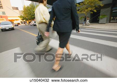 Businesspeople cross the street View Large Photo Image Stock Image - Businesspeople cross the street. Fotosearch