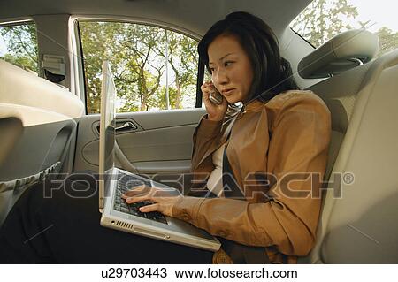 Businesswoman on the cell phone View Large Photo Image Stock Image - Businesswoman on the cell phone. Fotosearch