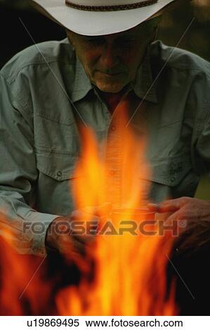 Camp fire at the end of a long day View Large Photo Image Stock Photography - Camp fire at the end of a long day. Fotosearch
