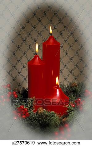 Candles with holly berries View Large Photo Image Stock Photo - Candles with holly berries. Fotosearch