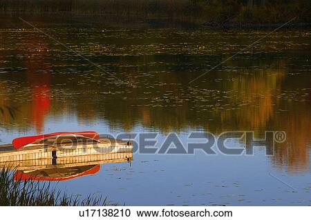 Canoe on dock View Large Photo Image Stock Image - Canoe on dock. Fotosearch