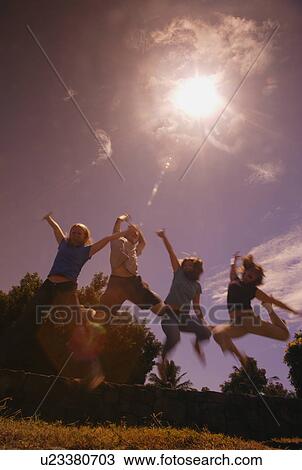 Stock Image - Carefree summer play. Fotosearch