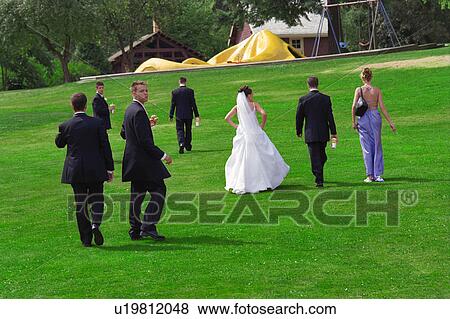 Stock Photo - Casual shot of bridal party. Fotosearch