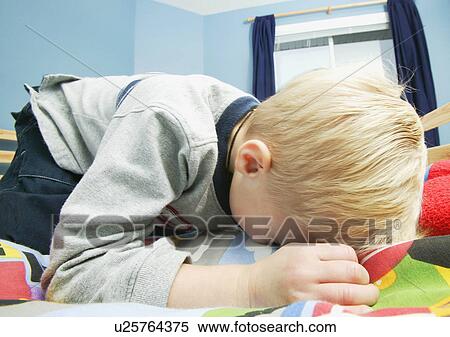 Stock Photography - Child cries. Fotosearch
