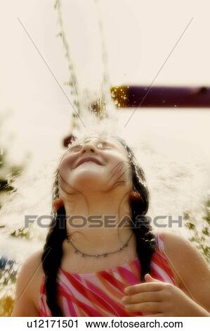 Child gets water in her face View Large Photo Image Stock Image - Child gets water in her face. Fotosearch