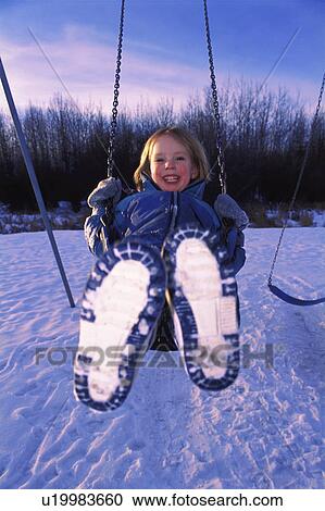 Child on a swing View Large Photo Image Stock Image - Child on a swing. Fotosearch