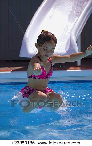 Child on waterslide View Large Photo Image Stock Photograph - Child on waterslide. Fotosearch