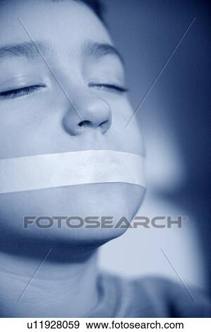Child silenced View Large Photo Image Stock Photo - Child silenced. Fotosearch