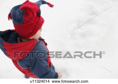 Child walking in snow View Large Photo Image Picture - Child walking in snow. Fotosearch
