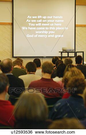 Church congregation singing worship on projector View Large Photo Image Stock Photograph - Church congregation singing worship on projector. Fotosearch