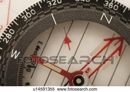 Stock Photography - Close up of a compass. Fotosearch