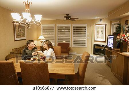 Stock Photo - Couple celebrate together. Fotosearch