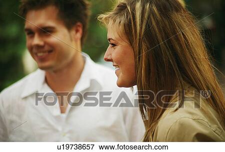 Couple conversation View Large Photo Image Stock Photo - Couple conversation. Fotosearch