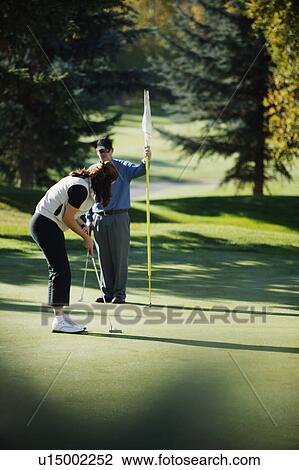 Couple go golfing View Large Photo Image Stock Image - Couple go golfing. Fotosearch