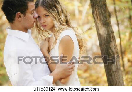 Picture - Couple holding each other. Fotosearch