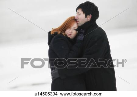 Picture - Couple holding each other. Fotosearch