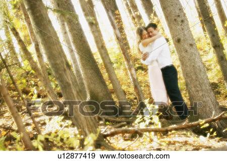 Couple hugging View Large Photo Image Stock Photo - Couple hugging. Fotosearch