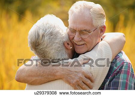 Stock Photo - Couple hugging. Fotosearch