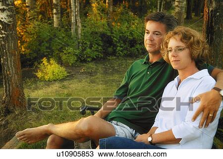 Couple relax together View Large Photo Image Stock Image - Couple relax together. Fotosearch