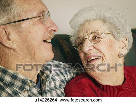 Picture - Couple share a joke. Fotosearch