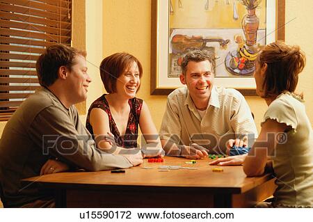 Stock Image - Couples play a game. Fotosearch