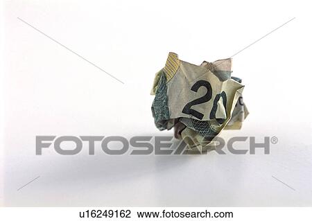 Stock Image - Crumpled twenty dollar bill. Fotosearch