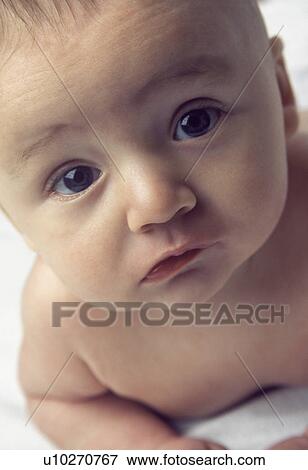 Curious baby View Large Photo Image Stock Photo - Curious baby. Fotosearch