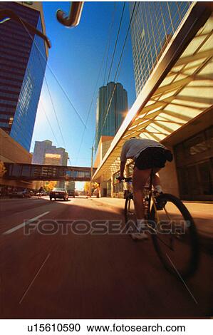 Cycling in the city View Large Photo Image Stock Image - Cycling in the city. Fotosearch