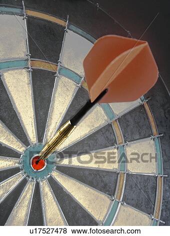 Dart on dartboard View Large Photo Image Stock Photo - Dart on dartboard. Fotosearch