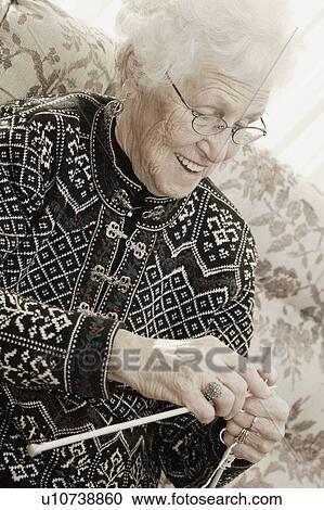 Elderly lady knitting View Large Photo Image Stock Image - Elderly lady knitting. Fotosearch