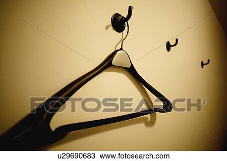 Empty hanger on the wall View Large Photo Image Stock Image - Empty hanger on the wall. Fotosearch