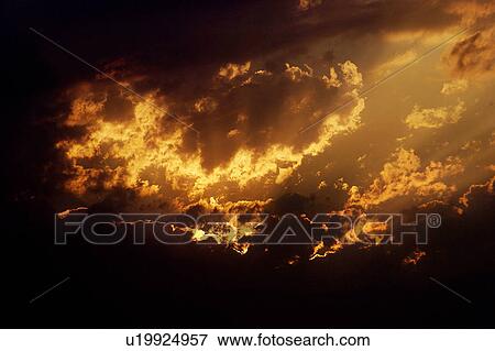 Evening clouds and sunset View Large Photo Image Stock Photo - Evening clouds and sunset. Fotosearch