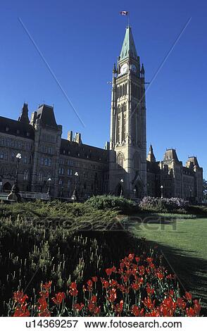 Exterior of large building and clock tower View Large Photo Image Stock Photo - Exterior of large building and clock tower. Fotosearch